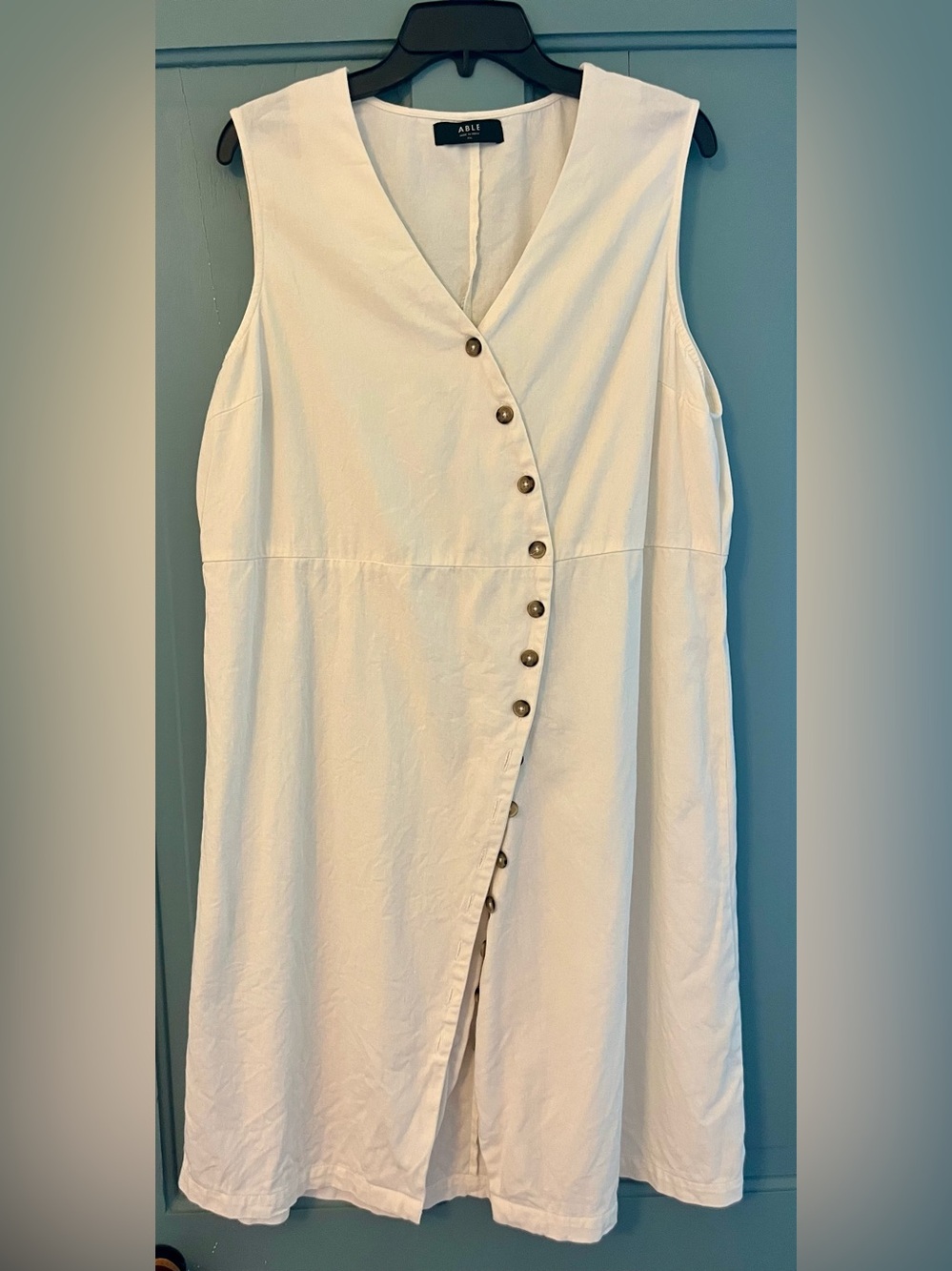 Able Cream Sleeveless V-Neck Dress with Asymmetric Button Detail